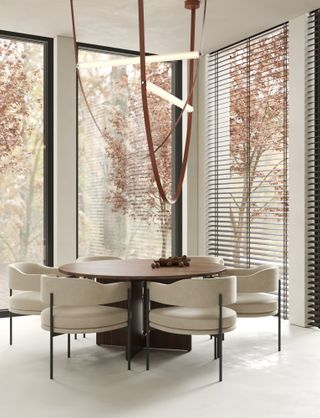 Dining room with round table and statement pendant