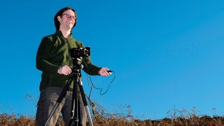 Photographer Chris Rutter with tripod and cable release