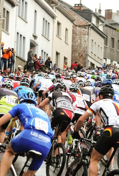 Elite men's start uphill at the World Cup in Houffalize.