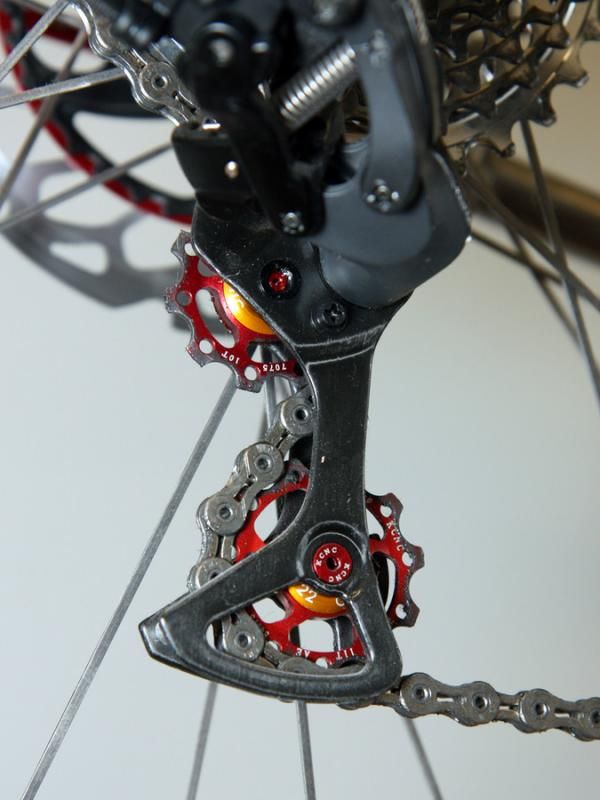 KCNC pulleys replace the stock units on the Shimano Dura-Ace Di2 rear derailleur on Fairwheel Bikes' special Titus 29er.