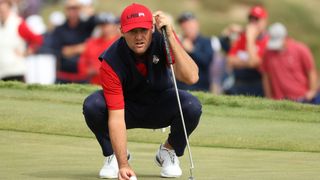 Scottie Scheffler lines up a putt at the Ryder Cup at Whistling Straits