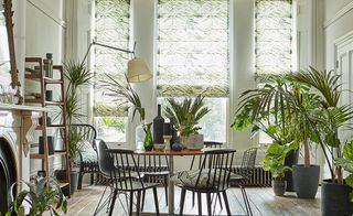botanical print blinds in a dining area