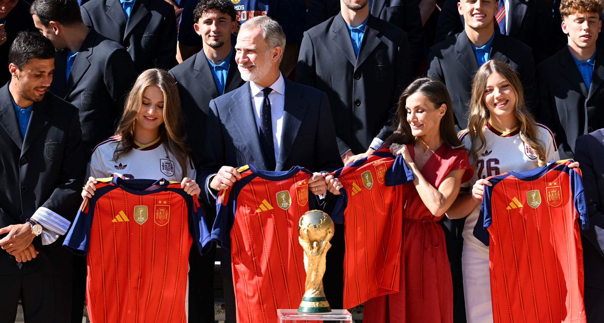Infanta Sofia, Princess Leonor, Queen Letizia and King Felipe holding Spain jerseys