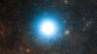 This wide-field view of the sky around the bright star Alpha Centauri was created from photographic images forming part of the Digitized Sky Survey 2. 