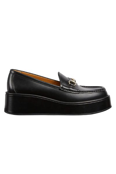 Gucci , 