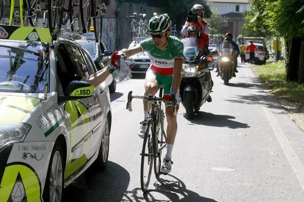 Giovanni Visconti, the Italian Champion, back at the team car.