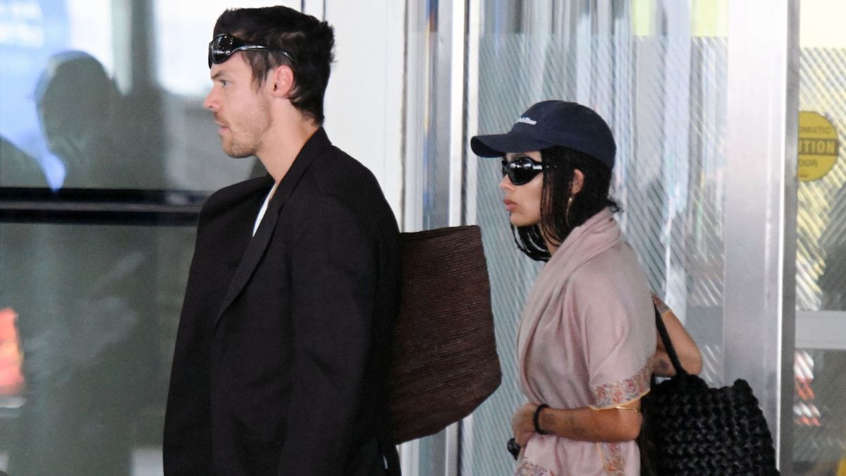 If You Want Your Airport Outfits to Give First Class—Ditch Your Jacket For This Elegant Staple Instead