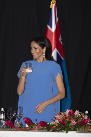 Meghan, Duchess of Sussex attends the State dinner on October 23, 2018 in Suva, Fiji. The Duke and Duchess of Sussex are on their official 16-day Autumn tour visiting cities in Australia, Fiji, Tonga and New Zealand.