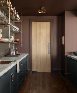 Chocolate brown painted walls in a kitchen