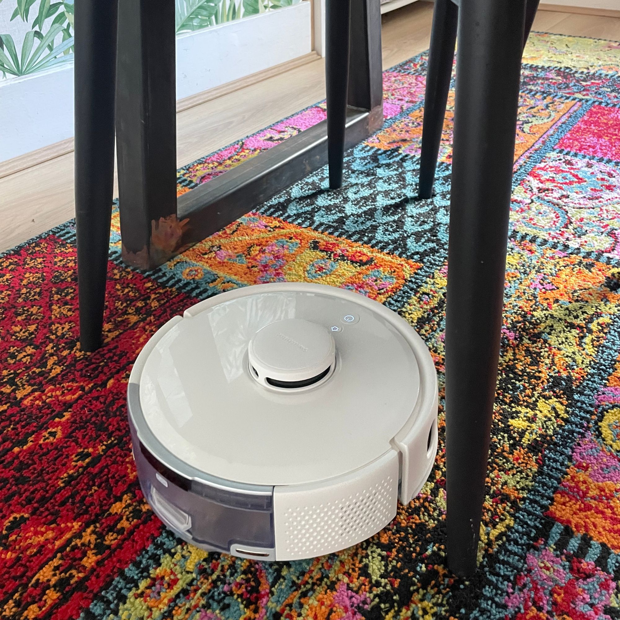 SwitchBot K11+ Robot Vacuum Cleaner with Mop cleaning colourful rug