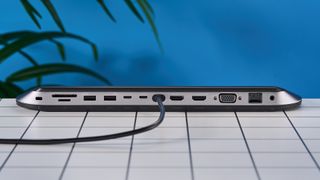 Belkin Connect 11-in-1 USB-C Pro Docking station on a white tabletop with a blue background