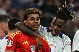 Spain's forward #19 Lamine Yamal and midfielder #17 Nico Williams celebrate their team's win at the end of the UEFA Euro 2024 semi-final football match between Spain and France at the Munich Football Arena in Munich on July 9, 2024.