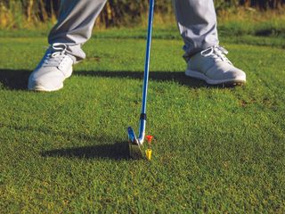 Visual drill to work on clubface position at impact in the golf swing (red and yellow tee)