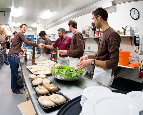 Ken Grossman, owner and CEO of Sierra Nevada Brewing Co. gives riders a few words of encouragement as they prepare dinner.