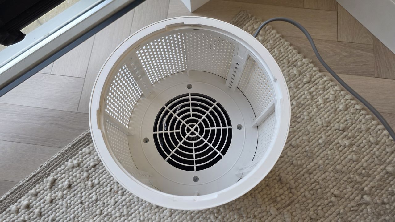 The interior of the Coway Airmega 100 with the filter removed.