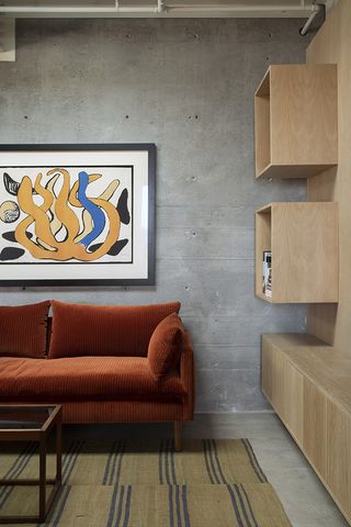sofa against concrete walls