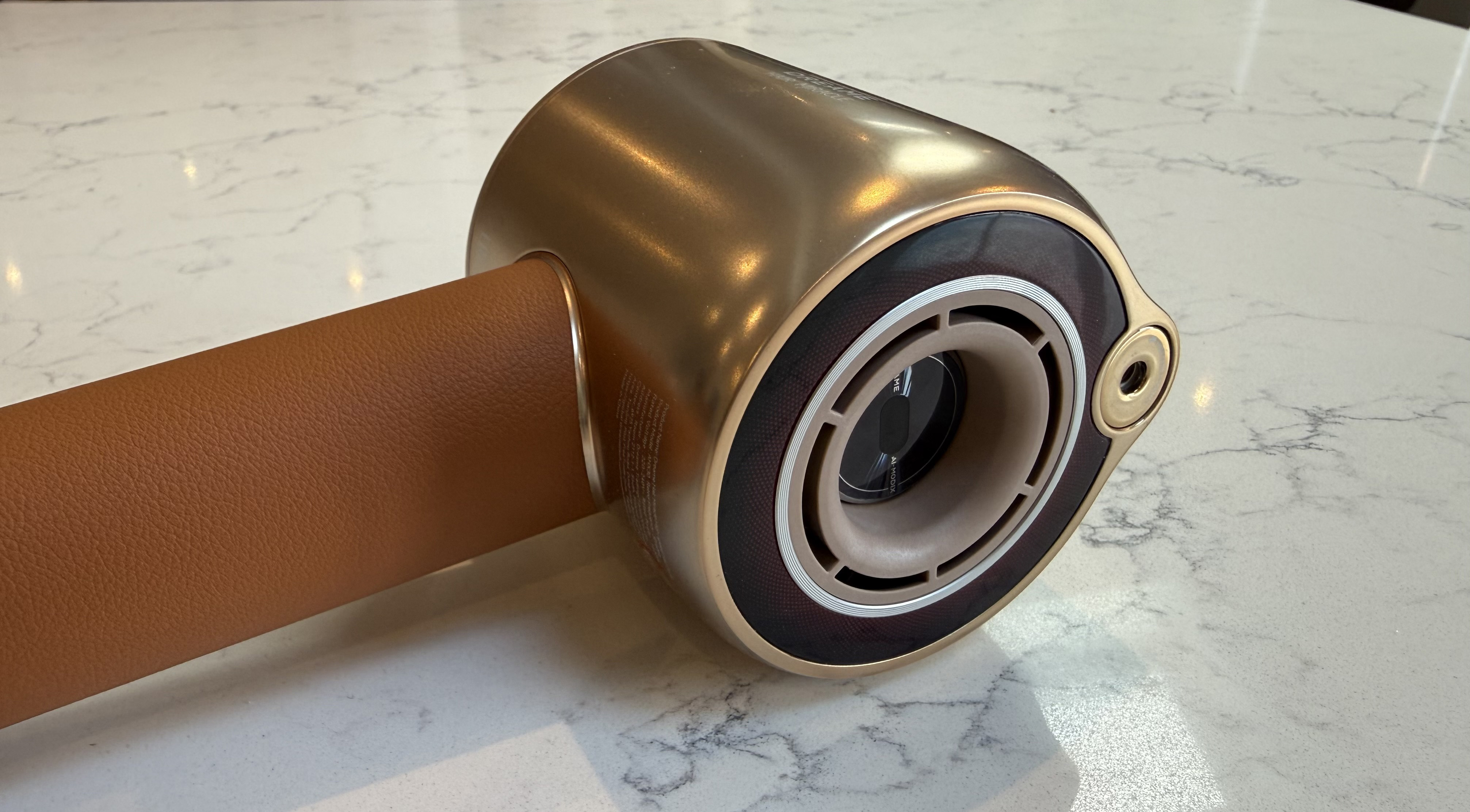 Front view of the Dreame Miracle Pro barrel showing the circular opening and the built-in essence cartridge