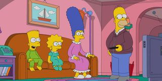 The cast of The Simpsons in their living room.