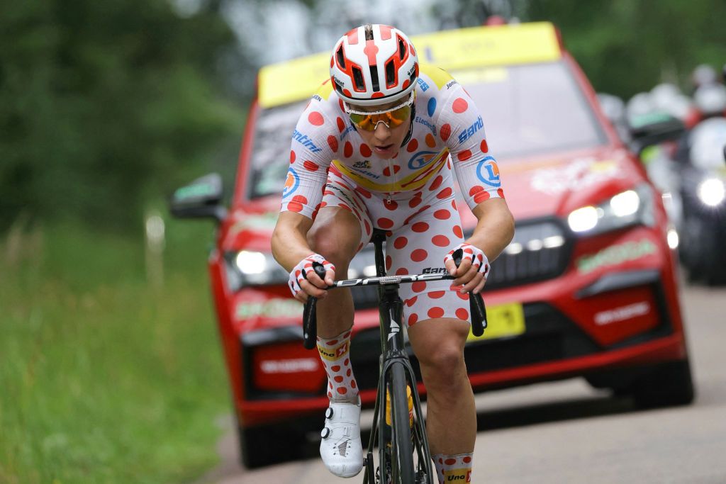 Uno-X Mobility team's Norwegian rider Jonas Abrahamsen wearing the climber's polka dot (dotted) jersey cycles in a breakaway during the 8th stage of the 111th edition of the Tour de France cycling race, 183,5 km between Semur-en-Auxois and Colombey-les-deux-Eglises, on July 6, 2024. (Photo by Thomas SAMSON / AFP)