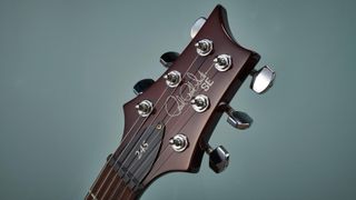 Close up of PRS SE 245 headstock