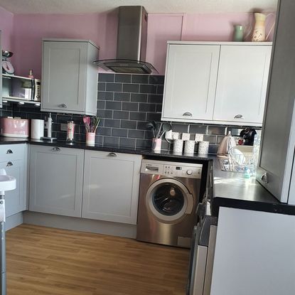 kitchen with chimney and tiles on wall