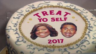 A "treat yo self" cake featuring Retta and Aziz Ansari as Donna and Tom