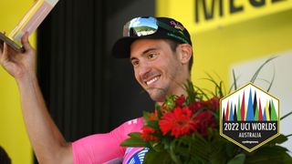 MEGEVE, FRANCE - JULY 12: Alberto Bettiol of Italy and Team EF Education - Easypost celebrates at podium as Most Combative Rider prize winner during the 109th Tour de France 2022, Stage 10 a 148,1km stage from Morzine to MegÃ¨ve 1435m / #TDF2022 / #WorldTour / on July 12, 2022 in Megeve, France. (Photo by Alex Broadway/Getty Images)
