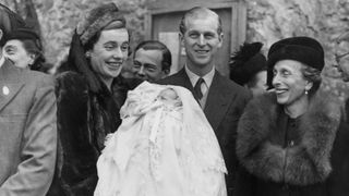 Lieutenant Mountbatten, the fiancé of Princess Elizabeth, attends the christening of Norton Knatchbull