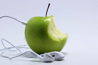 Apple iPod headphones with apple fruit