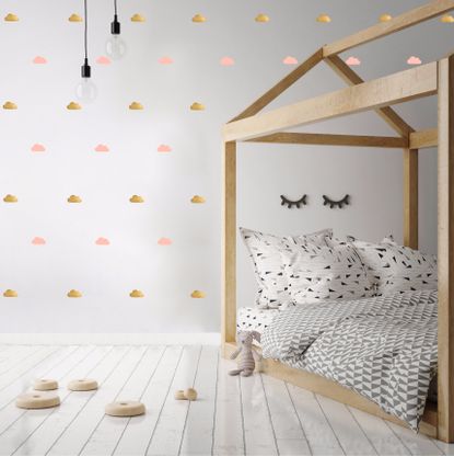 kids bedroom with white walls and wall stickers