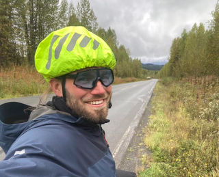 James Benson-King smiles on his epic cycling challenge