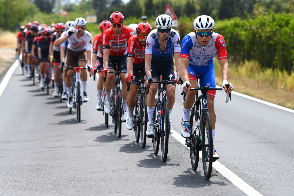 SCALEA ITALY MAY 12 LR Thomas De Gendt of Belgium and Team Lotto Soudal Pieter Serry of Belgium and Team QuickStep Alpha Vinyl and Clement Davy of France and Team Groupama FDJ lead the peloton during the 105th Giro dItalia 2022 Stage 6 a 192km stage from Palmi to Scalea Giro WorldTour on May 12 2022 in Scalea Italy Photo by Tim de WaeleGetty Images
