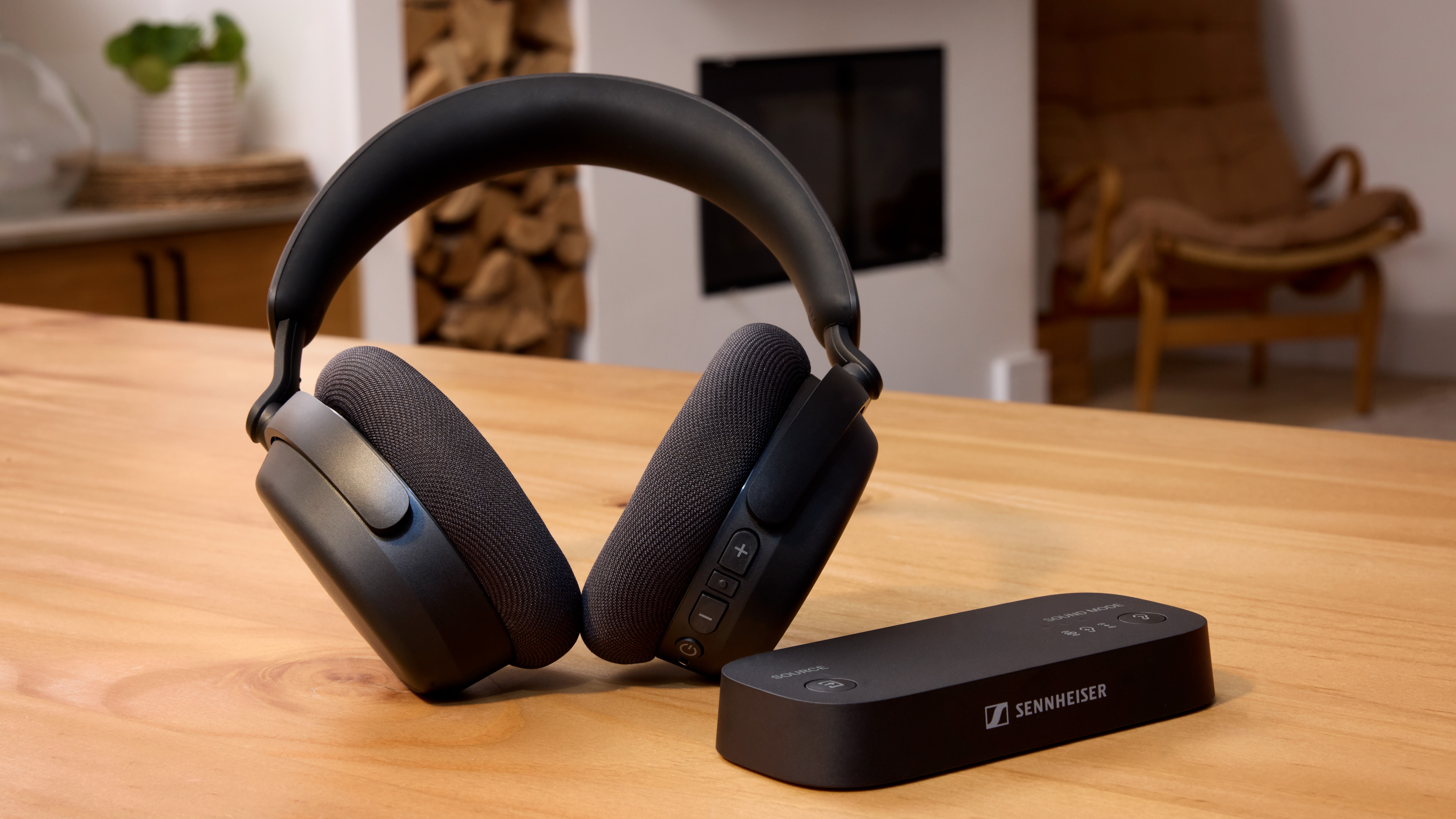 Sennheiser RS 275 TV Headphones in black with the accompanying transmitter