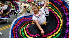 Brooklyn's Mexican community marches down 5th Avenue in the Sunset Park neighborhood during a Cinco de Mayo parade on May 7, 2017 in Brooklyn, New York