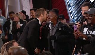Ryan Gosling Whispers at the Oscars