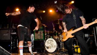 Deftones playing live onstage in 2006