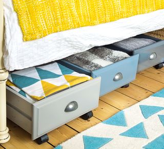 under bed storage with blue and grey drawers