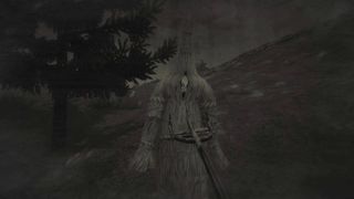 Best horror games - Mundaun screenshot of a figure hiding inside a straw effigy