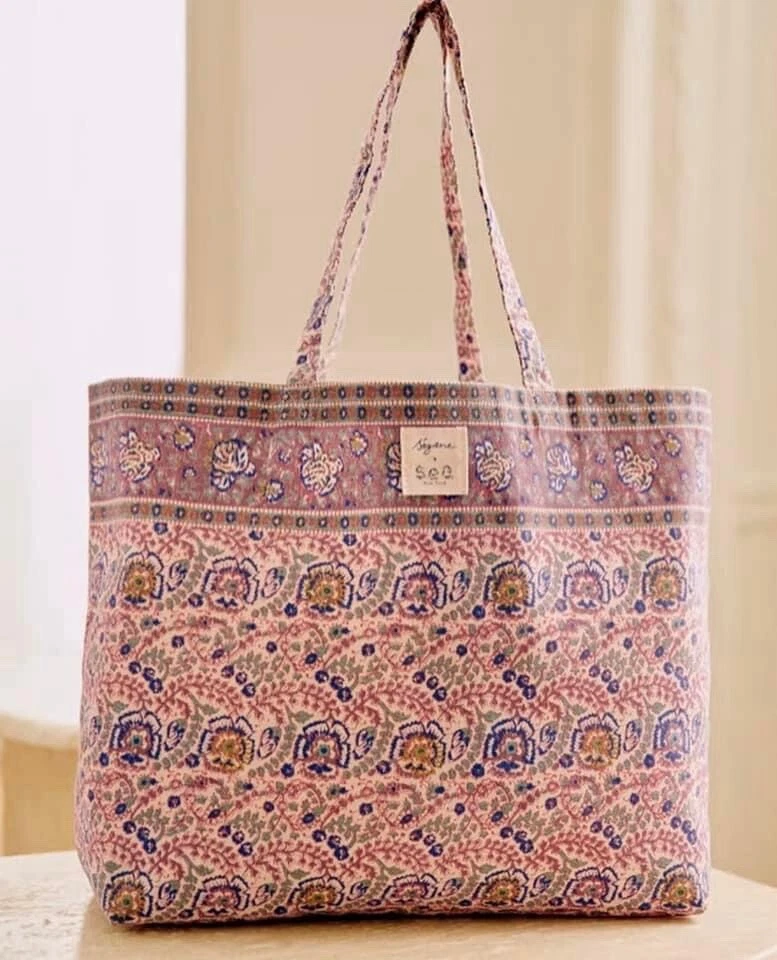sezane tote bags ranging from printed to floral and striped