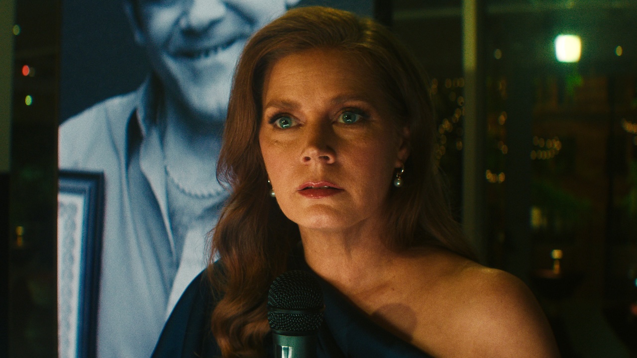 Anna Bowden in fancy dress at gala event looking very concerned in Cape Fear TV show