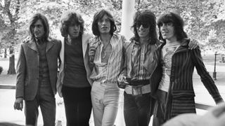 LONDON-6/13/69-: Here is the new Rolling Stones line-up. Mick Taylor (second from left), a young lead guitarist, has just joined the pop group in place of Brian Jones, who quit after disagreement on music policy. The group is shown Hyde Park. Left to Right: Drummer Charlie Watts, Mick Taylor, lead singer Mick Jagger, guitarist Keith Richard and bass-player Bill Wyman