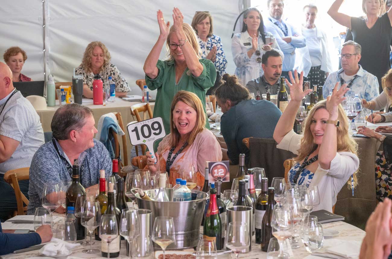Image of people bidding at the Sonoma County Barrel Auction.