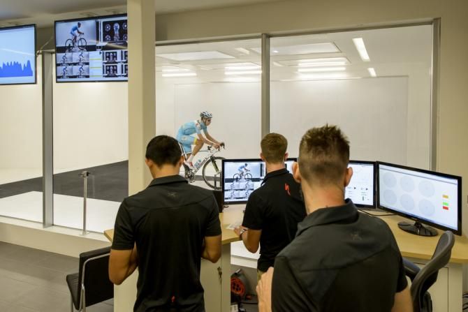 Specialized staff check Aru's performance and position during his wind tunnel testing