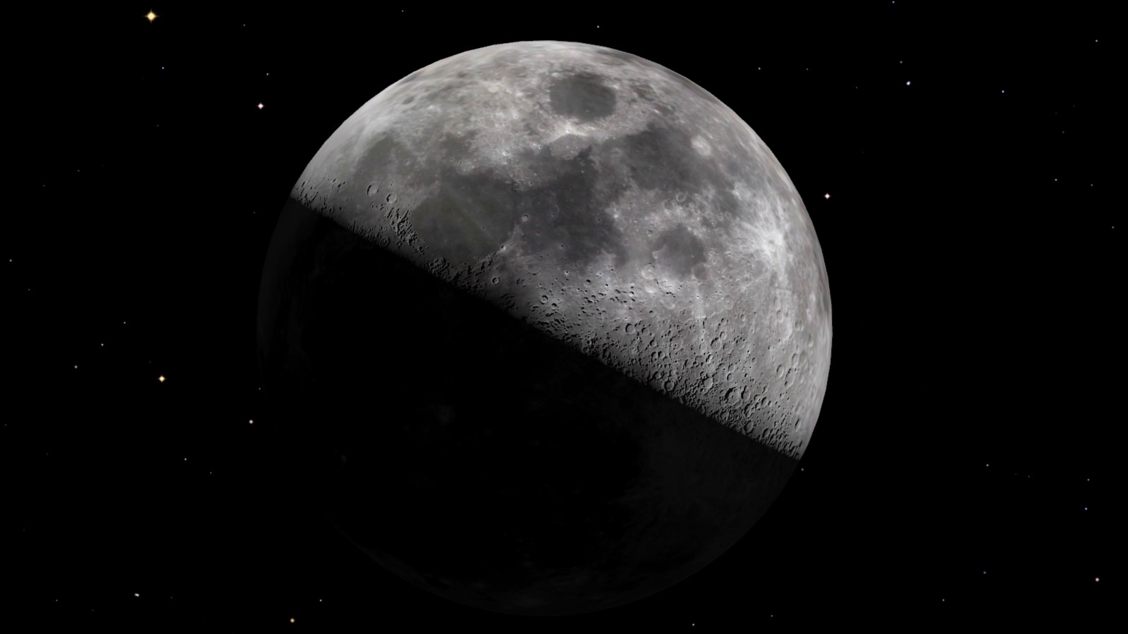 A large moon with part of it darkened out over a black background