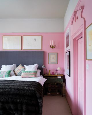 Pink bedroom with grey headboard
