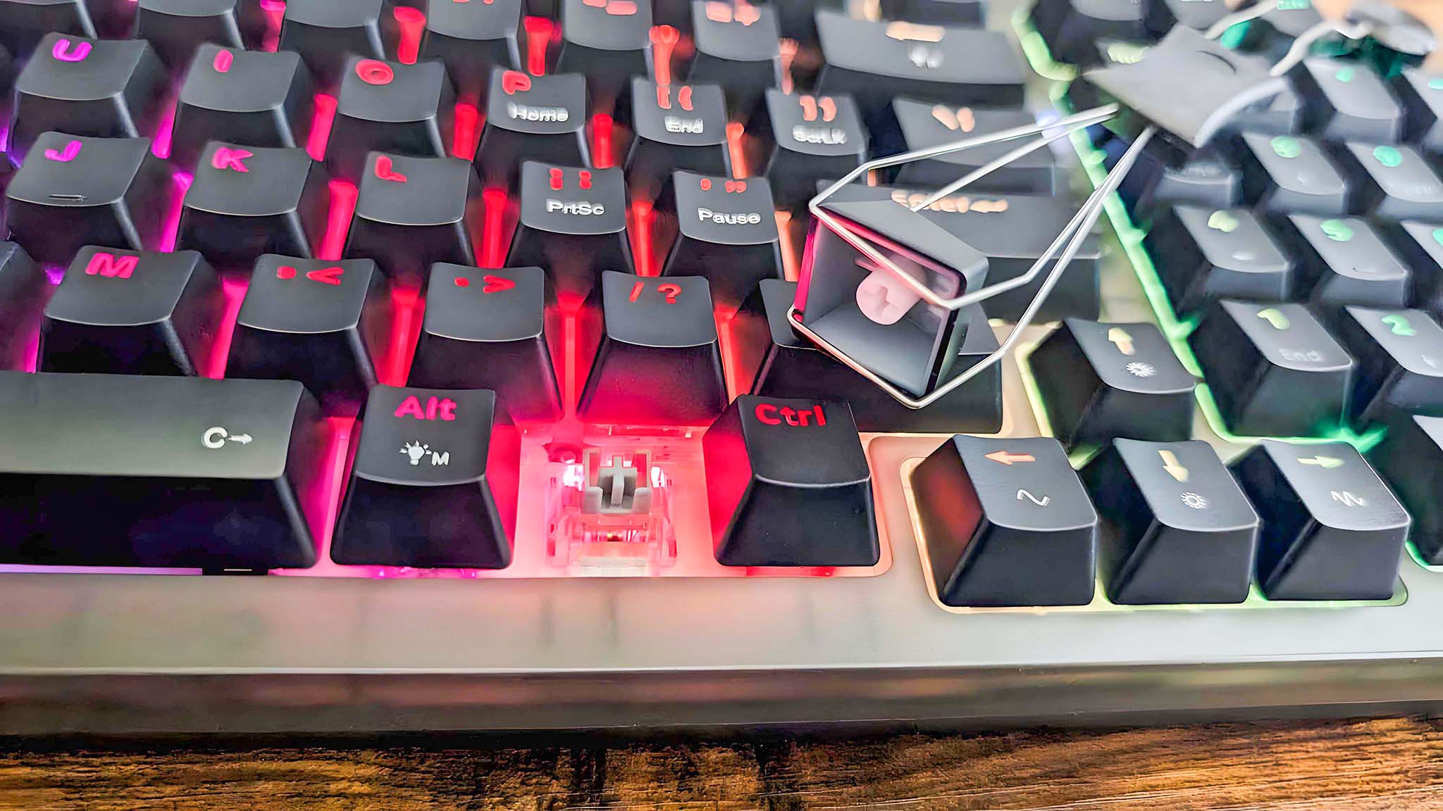 The Fn key removed from the iBuyPower MK9 Pro RGB Mechanical Keyboard.