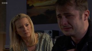 Kathy comforts Ben as he cries