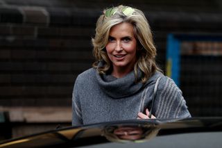 Penny Lancaster getting into a car