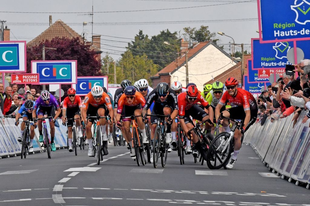 Team DSMs Australian Sam Welsford CR sprints next to Human Powered Healths Dutch Arvid de Kleijn CL as Lotto Soudals Belgian Arnaud De Lie 2ndR and Arkea Samsics British Daniel McLay R crashes during the 161 km between Dunkirk and Aniche first stage of the 4 jours de Dunkerque Four days of Dunkirk cycling race in Aniche northern France on May 3 2022 Dutch rider Arvid de Kleijn Human Powered Health was declared winner of the first stage of the Four Days of Dunkerque on May 3 2022 in Aniche after Australian rider Sam Welsford was dropped Welsford Team DSM was the first to cross the line but was considered responsible for the crash that sent Arnaud De Lie Lotto Soudal and Daniel McLay Arkea Samsic to the ground Photo by FRANCOIS LO PRESTI AFP Photo by FRANCOIS LO PRESTIAFP via Getty Images