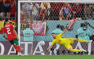 Achraf Hakimi converts a penalty for Morocco against Spain in the last 16 of the 2022 World Cup in Qatar.